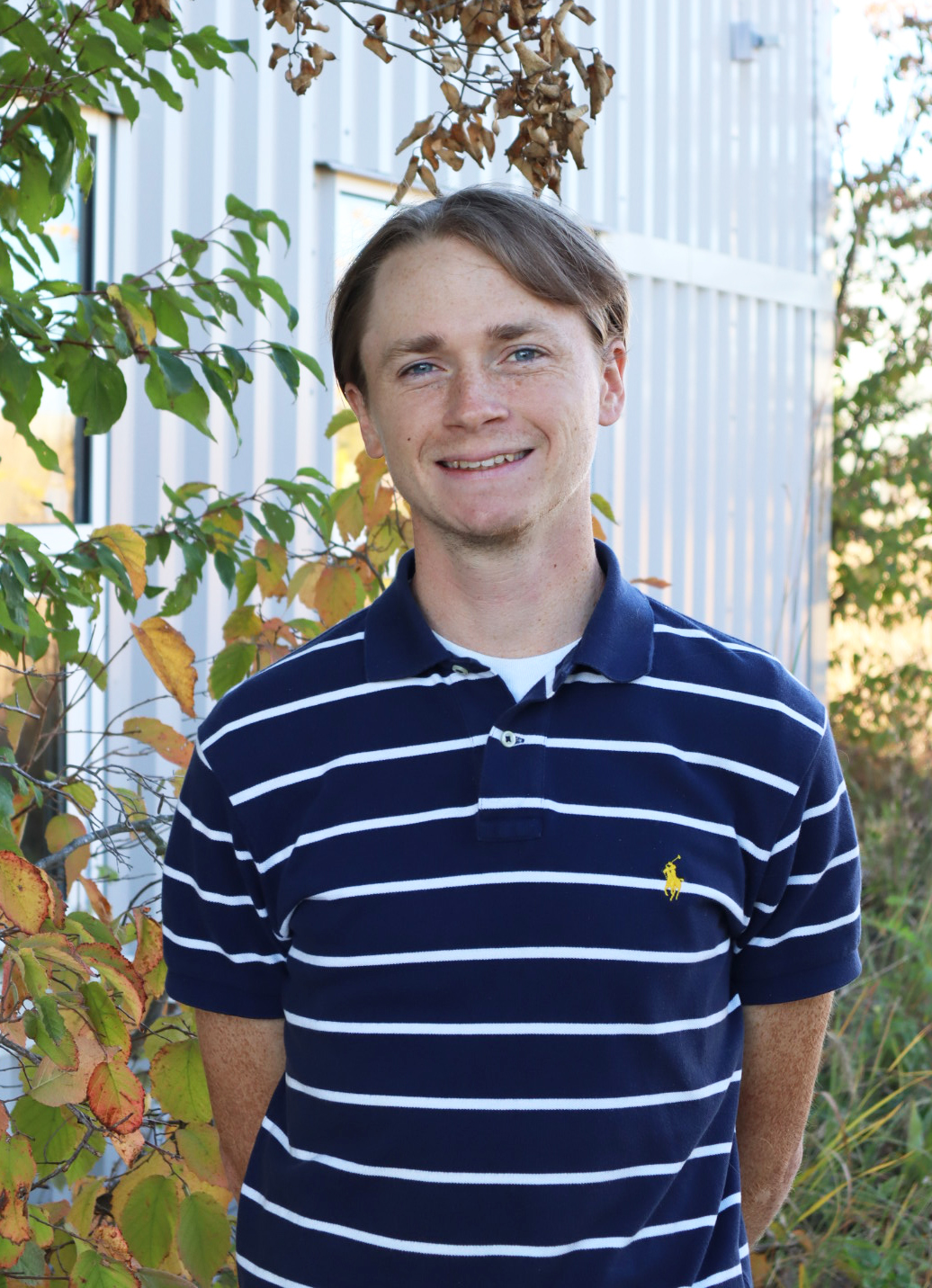 Connor in front of the TPC building. 